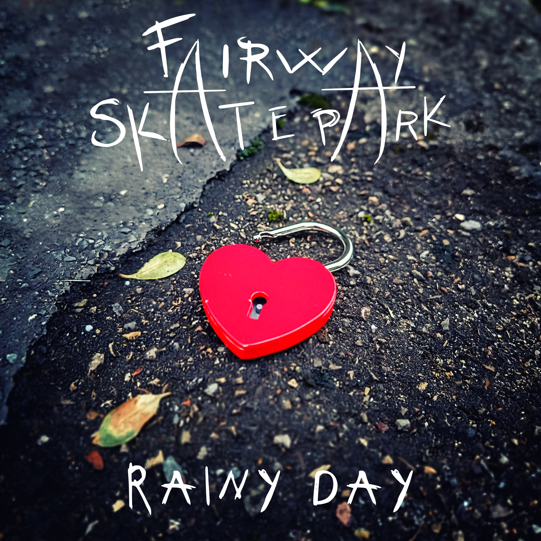 Rainy Day Album Cover, Fairway Skatepark at the top, Rainy Day at the bottom, open heart lock on aspahlt in the center